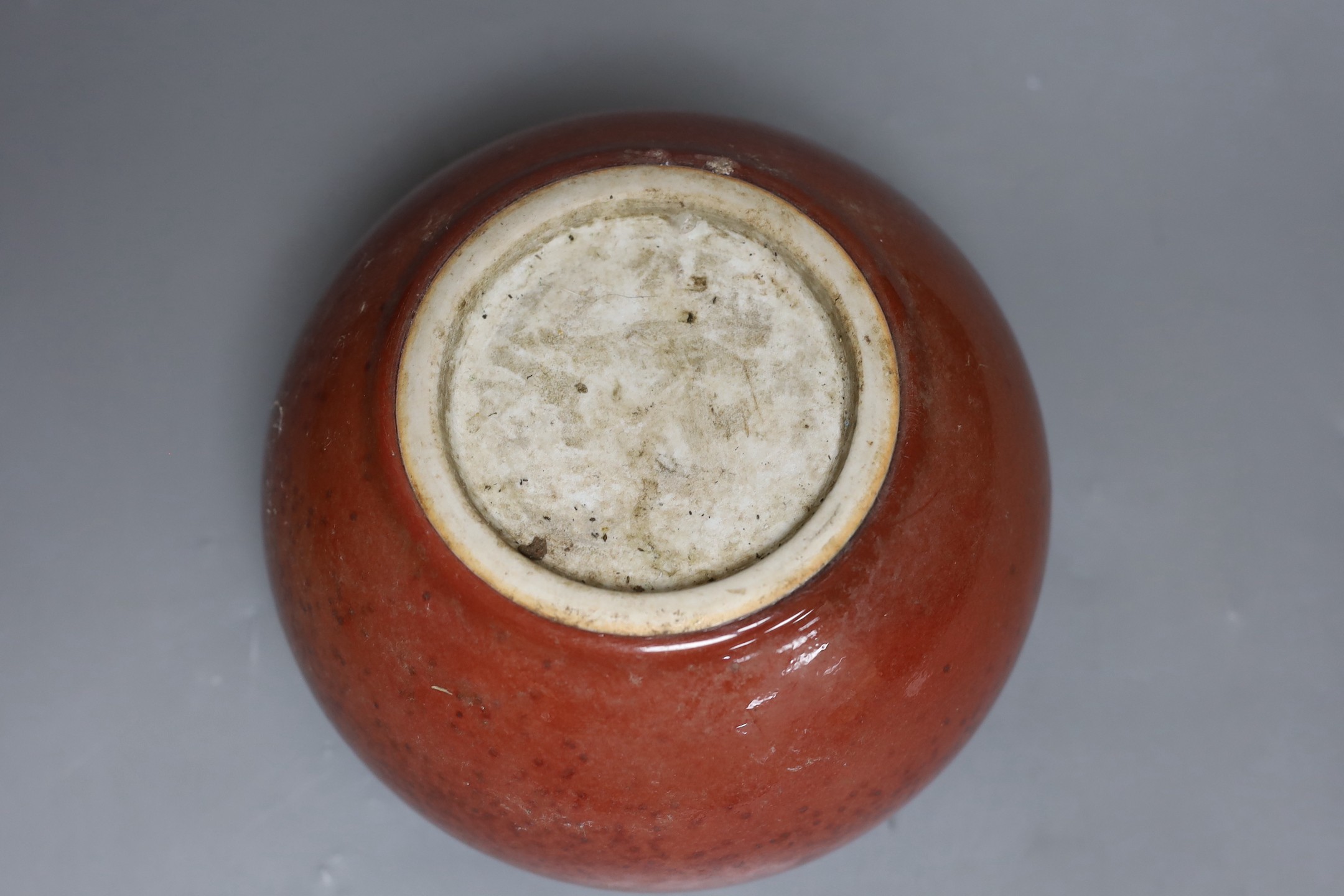 A Chinese sang de boeuf glazed jardiniere, 14cm tall